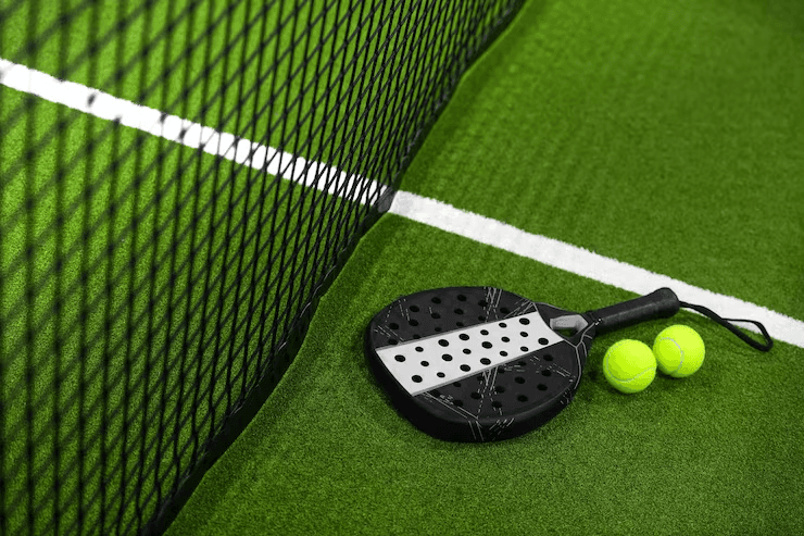 Padel court and paddle close-up